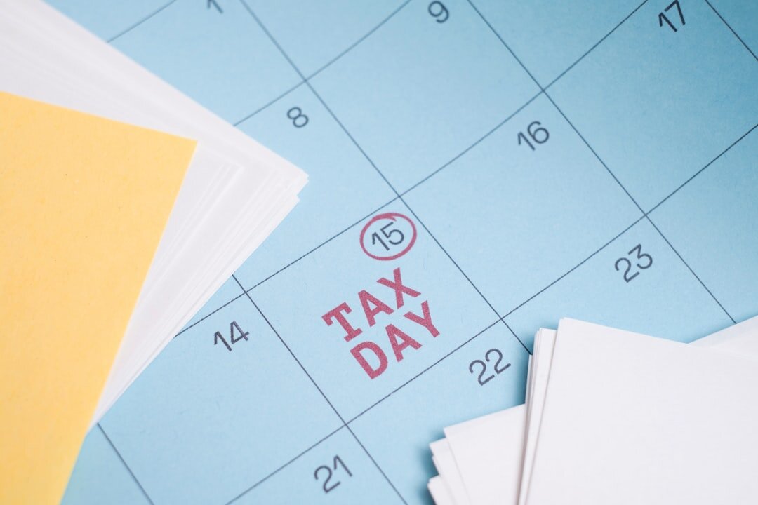 Calendar marked with "tax day" on the 15th.