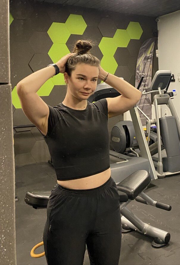 Olena Hilova, physiotherapist and online personal trainer, in the gym where she coaches her clients